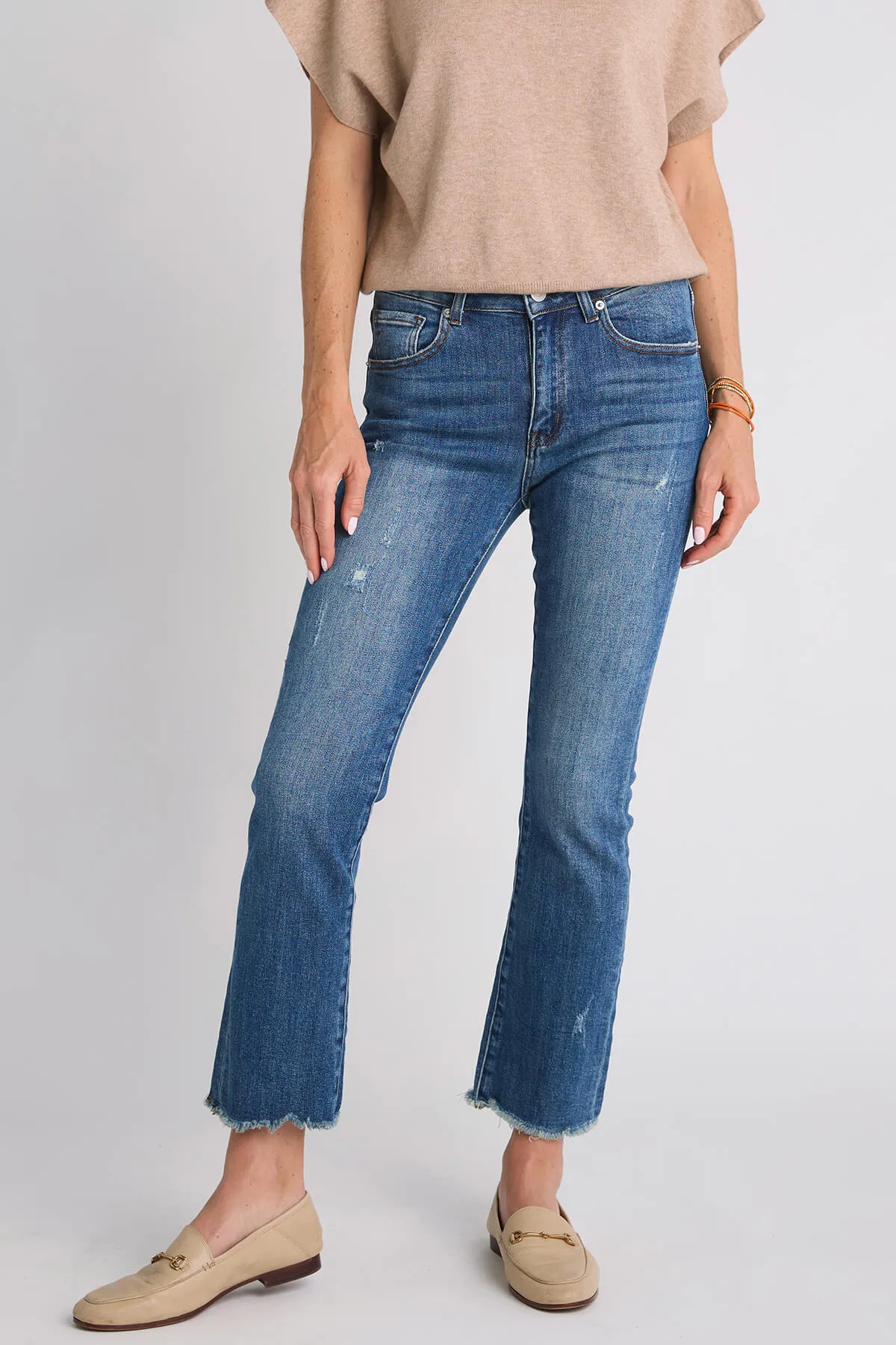 Risen Slightly Distressed Frayed Hem Straight Leg Jeans