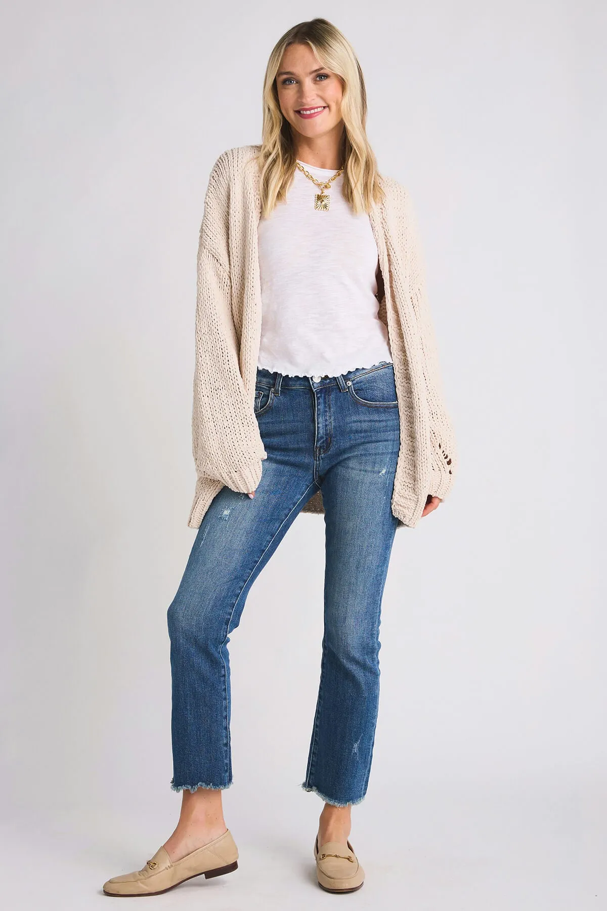 Risen Slightly Distressed Frayed Hem Straight Leg Jeans